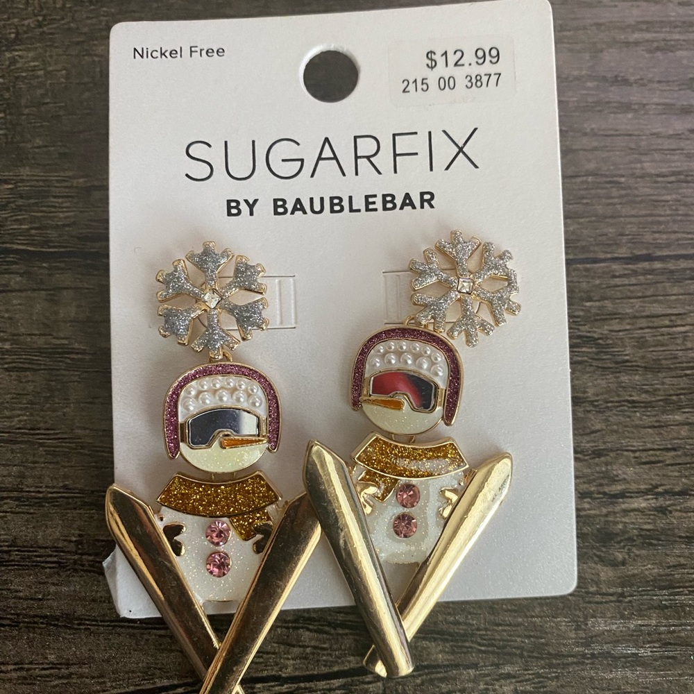 Skiing snowmen earrings.